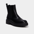 Boots chelsea crantées noir femme - 1
